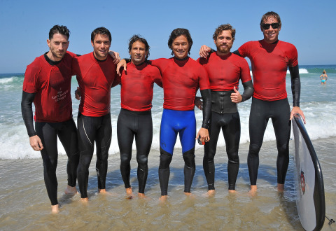 Actor Josh Bowman and professional surfers Kalani Robb, C.J. Kanuha and Alek Parker taught Surf Camp With Autism Society San Diego and the Tommy Hilfiger Corporate Foundation. (Getty Images/Angela Weiss)
