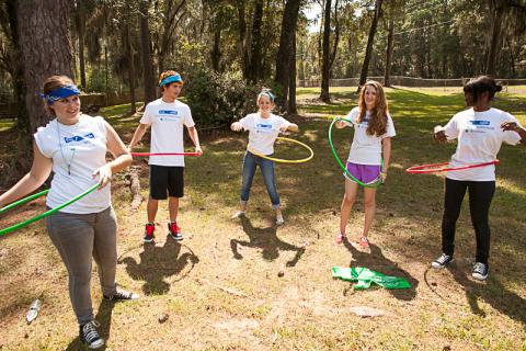 Teen Health Ambassadors (l-r) Kaitlyn Pace, Brandon Bradford, Jasmin Rhea, Mikayla Carmichael and Alexis Pless from Santa Rosa participate in hula-hoop competition as part of Florida 4-H and UnitedHealthcare Eat4-Health partnership at Camp Cherry Lake. (Photo: Dawn McKinstry)