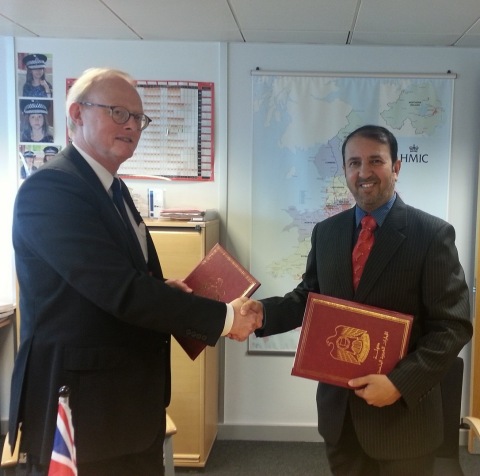 The MoU signing ceremony, Major General Nasser Lakhrebani Al Nuaimi and Tom Winsor (Photo: Business Wire)