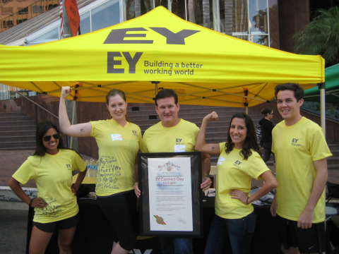 EY (formerly Ernst & Young) closed its Greater Los Angeles offices on Friday, Sept. 27, so its professionals could volunteer throughout the community. Pictured at the YMCA Stair Climb: EY's Deblina Biswas, Dasha Russ, Keith Lupton (Ernst & Young partner and YMCA board member), Alejandra Rossil and Travis Rose. (Photo: Business Wire)