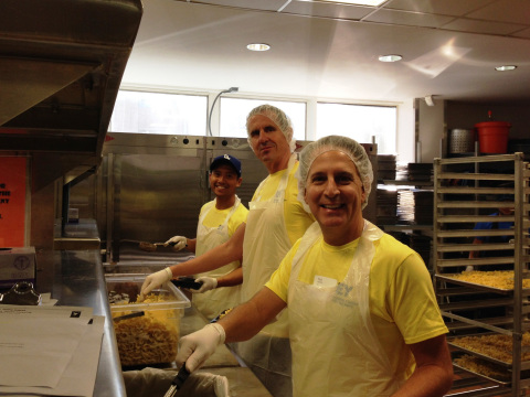 EY (formerly Ernst & Young) closed its Greater Los Angeles offices on Friday, Sept. 27, so its professionals could volunteer throughout the community. Pictured at Project Angel Food: EY's John Teves, Denis Cagna and Paul Hardoin. (Photo: Business Wire)