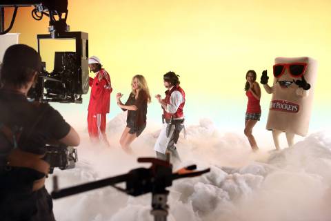 In this image released by HOT POCKETS® brand sandwiches on Tuesday, Oct. 8, 2013 - Snoop Dogg, Kate Upton and Oliver Cooper are seen on the set of the "You Got What I Eat" music video in Los Angeles; visit hotpockets.com/HotterPockets. (Photo: Business Wire)