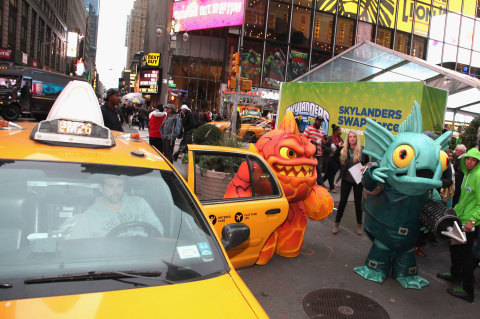NEW YORK, NY - OCTOBER 10: In this photo distributed by Activision Publishing, Inc., Skylanders Eruptor and Gill Grunt meet fans as they wait to enter &ldquo;SWAPtoberfest&rdquo; &ndash; an interactive experience built in the middle of Times Square, New York on Oct. 10 in celebration of the North American launch of Skylanders SWAP Force&trade; on Oct. 13, 2013 in New York City. (Photo by Donald Bowers/Getty Images for Activision)