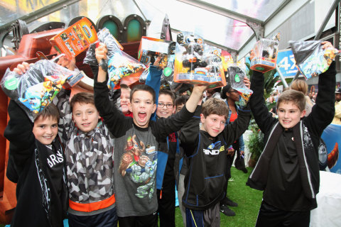 NEW YORK, NY - OCTOBER 10: In this photo distributed by Activision Publishing, Inc., kids take in all the activities of &ldquo;SWAPtoberfest&rdquo; &ndash; a life sized build out of the world of Skylanders in the middle of Times Square in New York to celebrate the Oct. 13, 2013 launch of Skylanders SWAP Force&trade;. (Photo by Donald Bowers/Getty Images for Activision)