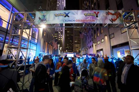 In this photo provided by Nintendo of America, eager fans wait at Nintendo World in New York on Oct. 11, 2013, to be among the first in the U.S. to purchase the newest Pokemon video games: Pokemon X and Pokemon Y for the Nintendo 3DS family of systems, including the new Nintendo 2DS. At the special launch event, attendees had the opportunity to purchase the games and participate in activities inspired by the Pokemon franchise.
