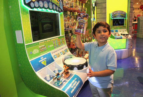 NEW YORK, NY - OCTOBER 13: In this photo distributed by Activision Publishing, Inc., fans flock to the Skylanders SWAP Force boutique inside Toys"R"Us Times Square in New York City during the Skylanders SWAP Force launch event on Oct. 10, 2013. Skylanders SWAP Force launches today in North America.