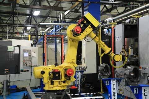 Michigan Manufacturer Engineered Machined Products (EMP) competes globally with the help of FANUC's industrial robots (Photo: Business Wire)