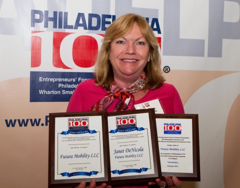 Janet DeNicola, Owner of Futura Mobility, shows off her winning plaques from the 2013 Philadelphia 100. (Photo: Business Wire)