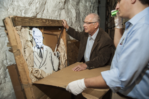 Historian Barry Bernson and KFC employee Trevor Park, right, looking at a rare, 50-year-old Colonel Sanders weathervane which once stood atop a KFC restaurant. The Colonel Sanders Collection auction, which concluded on Oct. 28, 2013, raised nearly $5,000 to benefit Feeding America and the World Food Programme. (Photo: Business Wire)