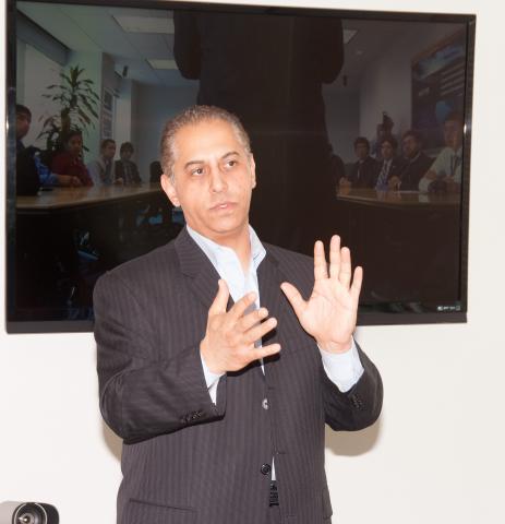 Neoris USA President Sam Elfawal welcomes students participating in NEOfrontiers Day at its global headquarters in Miami during Global Entrepreneurship Week. (Photo: Business Wire)