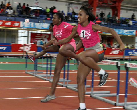 Junior Olympic Champions Sandreeka Bancroft of Cardozo High School in Queens (#1), and Tia Livingston of Union Catholic High School in Scotch Plains, NJ compete in the hurdles at the final preliminary meet of the 40th annual Colgate Women's Games in New York City, held Saturday, November 30th. The pair heads to the semi finals at the Armory, December 22, 2013 where participants  contend for a spot in the finals on December 28, 2013 to compete for trophies and educational grants-in-aid from Colgate-Palmolive Company. (PHOTO CREDIT: Lem Peterkin, Colgate Women's Games)
