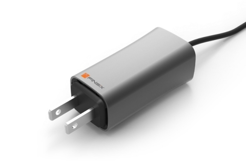 FINsix's miniature 65 watt laptop adapter. (Photo: Business Wire)