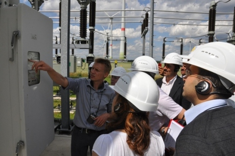 ReGrid participants from Morocco visit a power transformer station next to a wind park during the seminar in Berlin/ Germany. (Photo: Business Wire)