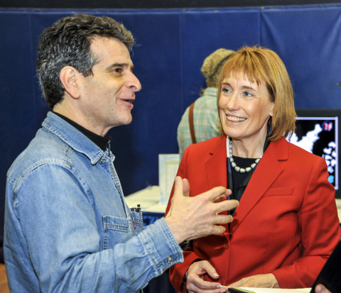 FIRST® Founder, Dean Kamen explains the 2014 season FIRST® Robotics Competition game, AERIAL ASSIST, to New Hampshire Governor, Maggie Hassan. (Photo: Business Wire)