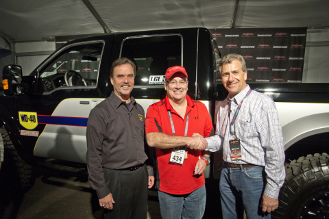 From left to right: Mike Freeman from WD-40 Company, Bill Barker (auction winner), Mike Spagnola from SEMA (Photo: Business Wire)