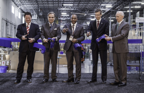 Craig Westbrook, Vice President - Aftersales, BMW of North America; Ludwig Willisch, President and CEO, BMW of North America; Marcus Knight, Mayor, Lancaster, Texas; Stefan Sengewald, Executive Vice President and CFO, BMW of the Americas and Lawrence P. Demski, Department Head, Parts Logistics, BMW of North America cut the ribbon to officially open the BMW Dallas Regional Parts Distribution Center (RDC) in Lancaster, Texas on January 27th, 2014. The fully-secured, LEED Silver certified, state-of-the art RDC will serve the Southern Region of the dealer network and will supply everything BMW dealers need to service their customers. (Photo: Business Wire)