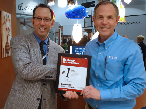 Eaton's Glenn Siegel (right) receives the Brand Leader award from Builder magazine, presented by Ed Kraft. The Halo product line has been recognized with this honor for 16 consecutive years. (Photo: Business Wire)