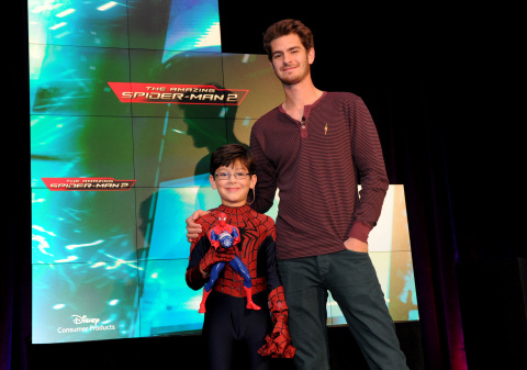 Actor Andrew Garfield, right, and co-star Jorge Vega help Disney Consumer Products unveil an innovative assortment of toys inspired by The Amazing Spider-Man 2 by Sony Pictures Entertainment, Monday, Feb. 17, 2014, at the American International Toy Fair in New York. (Photo by Diane Bondareff/Invision for Disney Consumer Products)