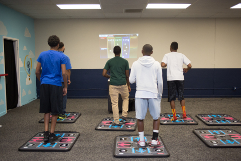 Youngsters at the Boys & Girls Club of Southern Nevada get active with a new "exergame" donated by UnitedHealthcare and KONAMI (Photo: Boys & Girls Club of Southern Nevada).