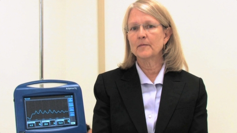 CEO and Founder, Jenny Freeman, pictured with the ExSpiron 1Xi Non-Invasive Minute Ventilation Monitor. {Photo: Business Wire)