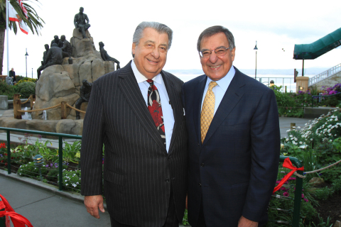 Ted Balestreri, CEO, Cannery Row Company and Secretary Leon Panetta celebrate the dedication of the Cannery Row Monument featuring John Steinbeck, Ed Ricketts and the colorful characters reminiscent of the historical Cannery Row. (Photo: Business Wire)