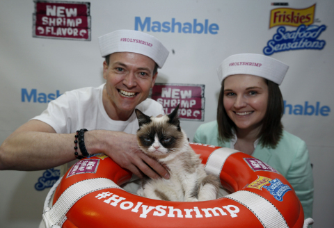 Friskies' "Official Spokescat," Grumpy Cat, takes time to frown with fans at her sea-faring photo booth at the Mashable House on Friday, March 7, 2014. Friskies donated 25,000 meals of Friskies Seafood Sensations with NEW shrimp flavor to Friends of Austin Animal Center, and fans can help increase the donation up to 50,000 meals by posting a photo of Grumpy Cat or their own cat in social media using the hashtag #HolyShrimp between March 7-9. (Erich Schlegel/AP Images for Friskies)