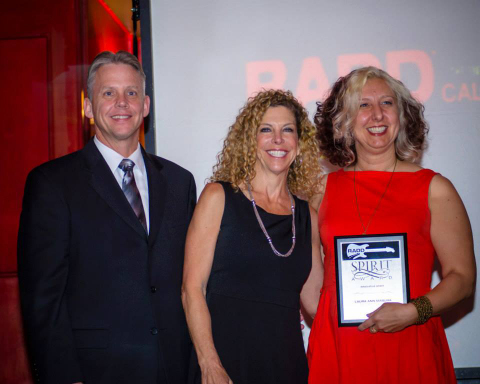 Timothy Gorsuch - (Alcoholic Beverage Control), Marian Novak - (Responsible Hospitality Coalition) present Laura Ann Masura (RADD NEHA Co-Chair) with a RADD Spirit Award for her dedication and support. (Photo: Business Wire) 