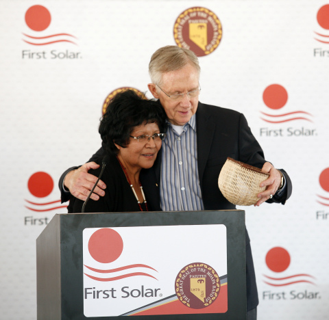 Aletha Tom, Chairwoman of the Moapa Band of Paiutes, presents US Senate Majority Leader Harry Reid with a basket as a gift for his support of the Moapa Southern Paiute Solar Project. (Photo: Business Wire)