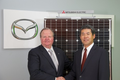 Jim O'Sullivan, president and CEO for Mazda North American Operations, and Katsuya Takamiya, president and CEO for Mitsubishi Electric US, Inc. celebrate installation of 317 kW solar electric system on Mazda's US R&D Center. (Photo: Mitsubishi Electric US, Inc.)