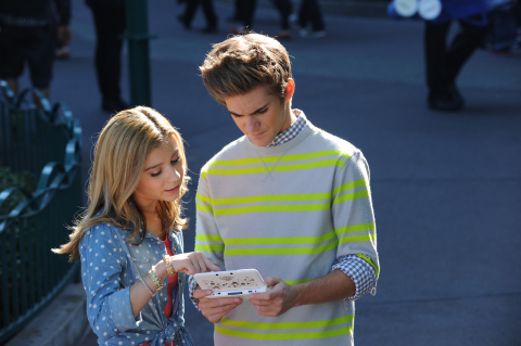 In this photo provided by Nintendo of America, actor G Hannelius, currently starring in the Disney Channel sitcom Dog With A Blog , films a promo for the new Disney Magical World game with actor Cole Pendery at the Downtown Disney® District last month. Disney Magical World launches exclusively for the Nintendo 3DS family of systems on April 11. Cole is holding the new Mickey Edition Nintendo 3DS XL system that will be available at Wal-Mart. (Photo: Business Wire)