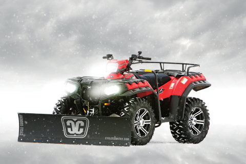 A Polaris Sportsman with a Cycle Country straight steel blade accessory. Today, Polaris Industries Inc. announced it has acquired Kolpin Outdoors, Inc. (Photo: Business Wire)