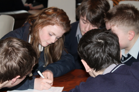 Mulroy College students (left to right): Shane Flood, Aine Green, Caolan Mc Laughlin, Shane Kerr and Connor Dougan, participate in a table quiz at Pramerica Systems Ireland. (Photo: Business Wire)  