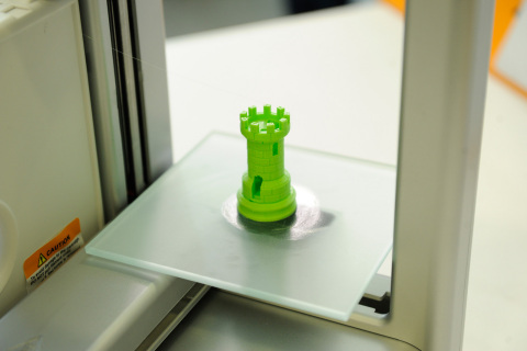 Staples new 3D printing experience centers feature demonstrations of 3D printers from 3D Systems, printing products like this sample chess piece. (Photo: Business Wire)