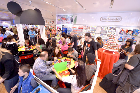 Fans visit Nintendo World store in New York on April 12, 2014, for a range of Disney themed activities in honor of the release of the Disney Magical World video game. Now available exclusively for the Nintendo 3DS family of systems, Disney Magical World allows players to interact with more than 60 Disney characters and embark on adventures through ghost-filled forests and dungeons. (Photo by Stephen Lovekin/Getty Images for Nintendo and © Disney)