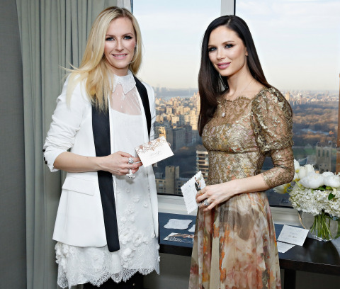 Keren Craig and Georgina Chapman, co-founders of Marchesa, showcasing the new Marchesa for Wedding Paper Divas stationery (Photo: Getty)