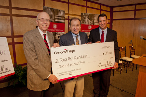 Texas Tech Chancellor Kent Hance and Dean of Engineering Al Sacco accept a $1 million check from Tom Mathiasmeier, ConocoPhillips president, North America Gas & Power. (Photo: Business Wire)