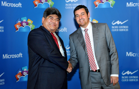 (From left) Dilip Rahulan, Executive Chairman, Pacific Controls with Bruno Delamarre, Microsoft Gulf's Regional Director Mid-Market and Partner Solutions (Photo: Business Wire)