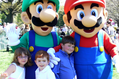 In this photo provided by Nintendo of America, Mario and Luigi meet fans Nicholas K., Allison K. and Daniel K. from Piedmont, Calif., during the 136th annual White House Easter Egg Roll on April 21, 2014, in President's Park (one of America's 401 national parks!) Nintendo joined with the National Park Foundation to offer guests the opportunity to take photos with the beloved characters and play Wii Fit U and Wii Sports Club, two games that ask players to get up and get active with Wii U, Nintendo's HD home console. (Photo: Business Wire)