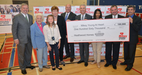 Heathwood Homes, which founded The Mikey Network, presented a cheque for $160,000 to fund the first year of operations for the Mikey Young At Heart program across the Peel board. Shown (L-R) Chairman of The Mikey Network and President of Heathwood Homes Hugh Heron; Mississauga Mayor Hazel McCallion; The Mikey Network student ambassador Emily Herbert; Peel District School Board Chair Janet McDougald; Director of The Mikey Network and COO Heathwood Homes Bob Finnigan; Peel District School Board Director of Education Tony Pontes; MPP Mississauga East-Cooksville Dipika Damerla; MP Mississauga-Streetsville Brad Butt and Applewood Heights Secondary School Principal Marcel Giraldi. (Photo: Business Wire)
