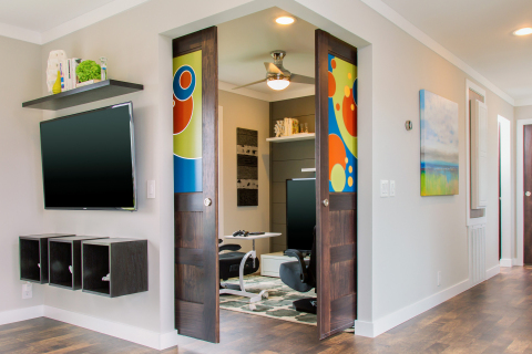 The Flex Room provides additional space that adapts with growing needs, changing from a gaming room now to a playroom in the future. (Photo: Clayton Homes)