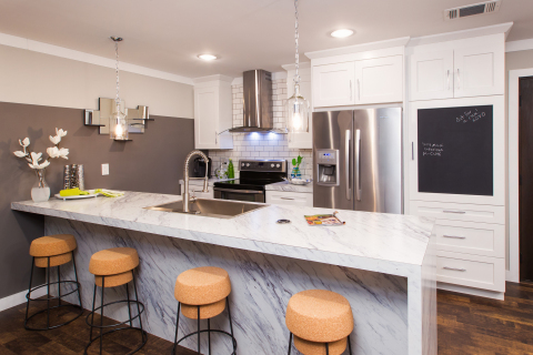 Embrace modern functionality and design in the centrally-located Cook area that includes a flexible prep space, built-in knife block and a pull-up outlet. (Photo: Clayton Homes)