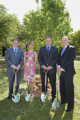 In celebration of National Arbor Day, the City of Dallas and Mary Kay Inc. dedicate the Mary Kay Ash Grove in Pioneer Park outside the Kay Bailey Hutchison Convention Center. From left: Nathan Moore, Chief Legal Officer for Mary Kay Inc.; Dr. Beth Lange, Chief Scientific Officer for Mary Kay Inc.; Adam Medrano, Dallas City Council District 2; and Ron King, Director of Conventions and Events for the City of Dallas. (Photo: Business Wire)