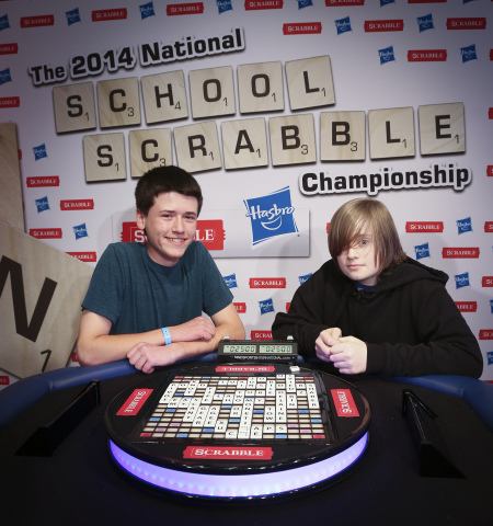 Eighth graders Jacob Sass of Texas and Thomas Draper of New Jersey are named the winners of the 2014 National School SCRABBLE Championship held in Providence, RI. (Photo: Business Wire)