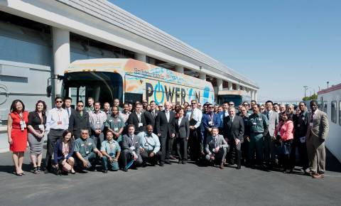 California Governor Jerry Brown stands with the American employees of BYD Motors at the April 2014 Unveiling Ceremony of the First American-Made, Long-Range, Electric Bus. (Photo: Business Wire)