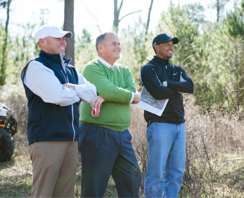 Tiger Woods to Design Golf Course at Bluejack National in Texas. (L to R) Beacon Land Development partners Casey Paulson and Michael Abbott meet with Tiger Woods during a site visit of Bluejack National's future golf course. (Photo: Business Wire)