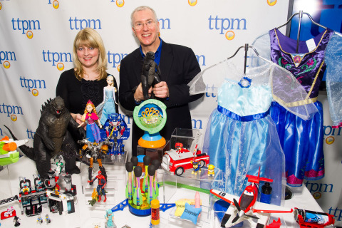 Laurie Leahey (L), senior editor of TTPM, and Chris Byrne, content director aka The Toy Guy®, appear with a selection of toys named to the 2014 TTPM Summer Play List, a round-up of the season's most fun and engaging products for children. The list was announced during the annual Spring Showcase press event on May 1, 2014 in NYC, hosted by TTPM, a consumer website publishing reviews, videos, and live price updates for all things play. (Photo: Business Wire)