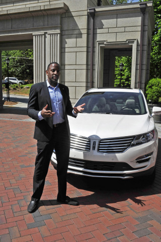 Jeff Reid, Lincoln MKC brand manager, leads a discussion of the all-new 2015 Lincoln MKC small premium utility on Thursday, May 1, at the Mandarin Oriental Atlanta. The program was part of Lincoln's five-city "Engage Your Senses" tour. Photo credit: Getty Images for Lincoln Motor Company