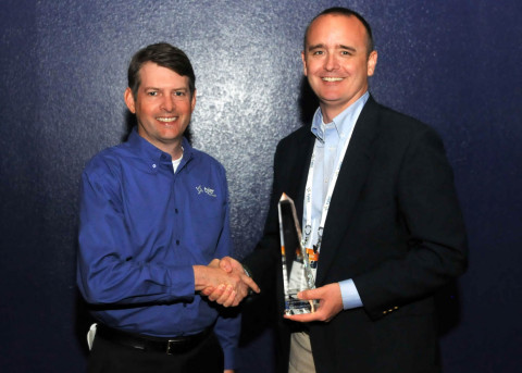 Asotin County Public Utility District's Treasurer Bob Sischo accepts a Tyler Excellence Award from Jeff Green, senior vice president at Tyler. (Photo: Business Wire)
