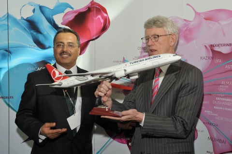 Mr. Ahmet Bolat, Chief Investment and Technology Officer at Turkish Airlines, presents Thomas P. Glynn, CEO of Massachusetts Port Authority, with a Turkish Airlines airplane model to celebrate the launch of the airlines' sixth U.S. gateway at Boston Logan International Airport. (Photo: Business Wire)