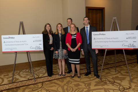 ConocoPhillips employees presented two checks totaling $1.185 million to The University of Texas at Austin. A portion of the donation, $685,000, will support the Cockrell School of Engineering, the McCombs School of Business, the College of Natural Sciences and the Jackson School of Geosciences. The remaining $500,000 is half of a $1 million pledge to support and name the ConocoPhillips Student Project Laboratory within the Cockrell School's new Engineering Education and Research Center. (Photo: Business Wire)